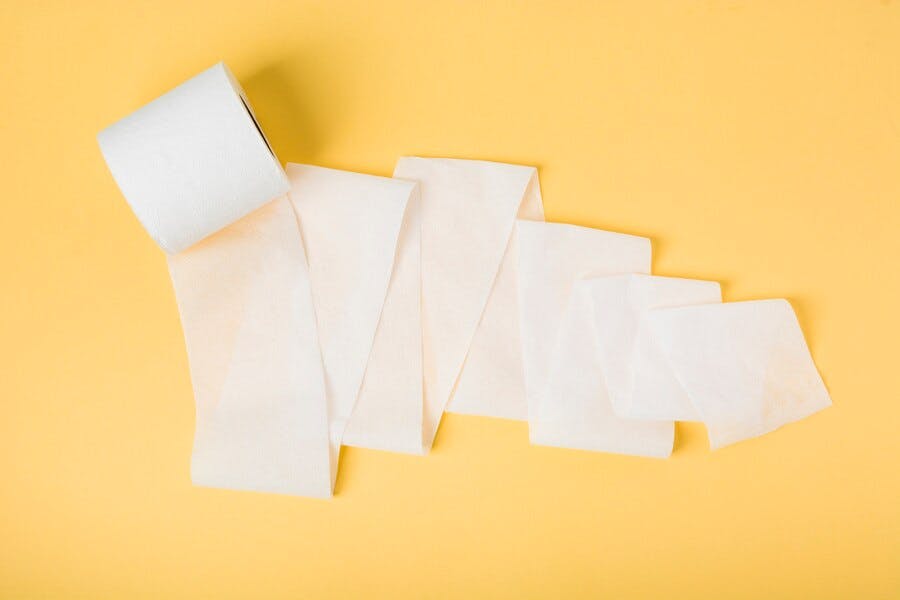 flat-lay-toilet-paper-roll-loose